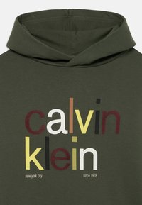 CALVIN KLEIN-Felpa Boy
